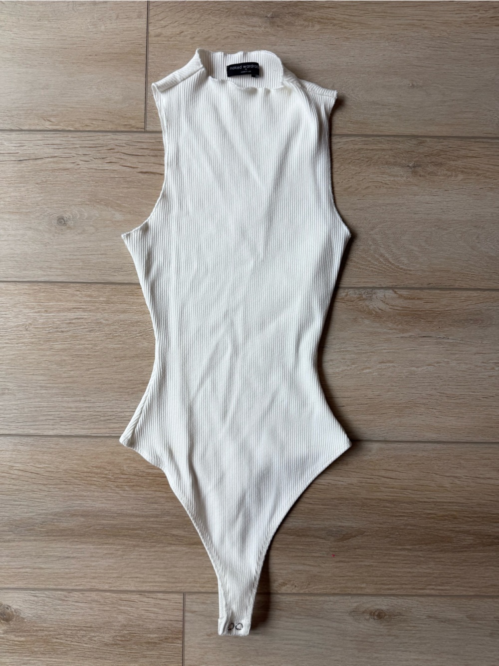 naked wardrobe Cream Ribbed Sleeveless One-Piece Bodysuit